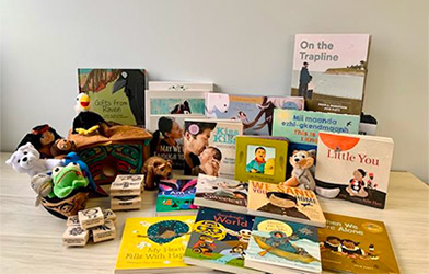 Books, puppets and stamps that represent First Nations culture